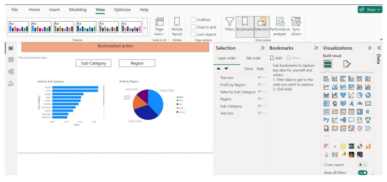 Selection pane with visuals disabled for Profit by Region and Sales by Sub-Category.